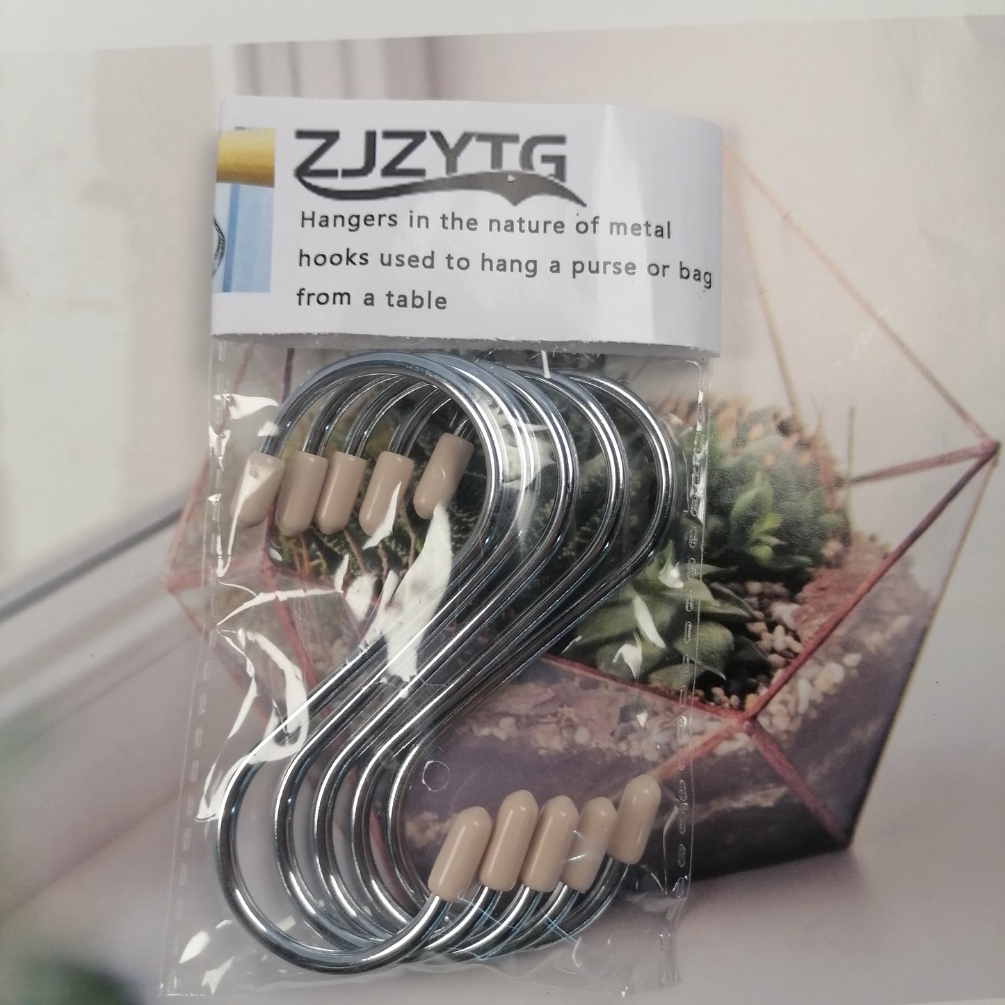 ZJZYTG Hangers in the nature of metal hooks used to hang a purse or bag from a table